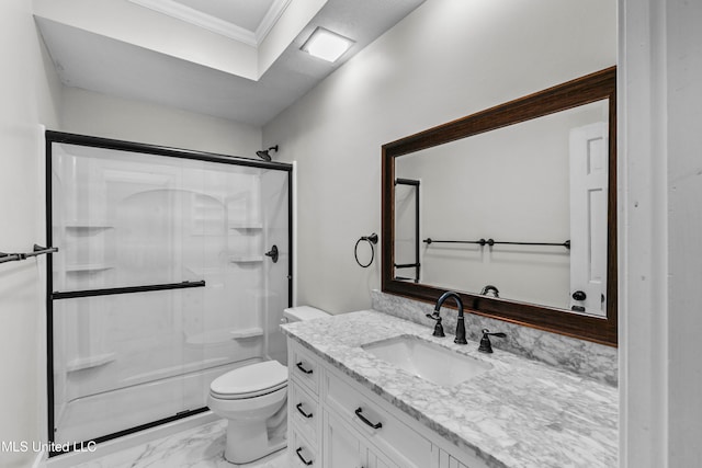 bathroom with vanity, toilet, and an enclosed shower