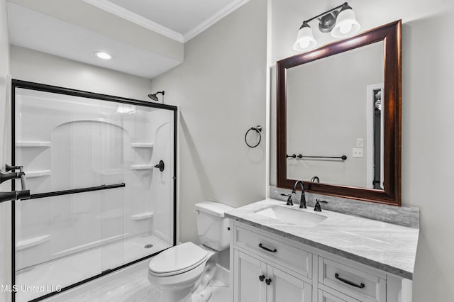 bathroom featuring vanity, ornamental molding, toilet, and an enclosed shower