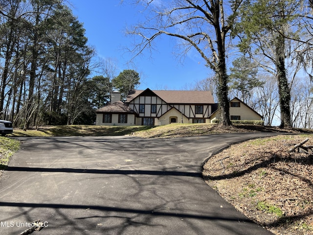 1609 SW Linda Dr, Clinton, MS 39056 - tudor house with driveway