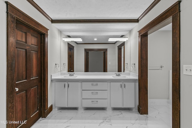 1609 SW Linda Dr, Clinton, MS 39056 - full bathroom featuring baseboards, marble finish floors, double vanity, ornamental molding, and a textured ceiling