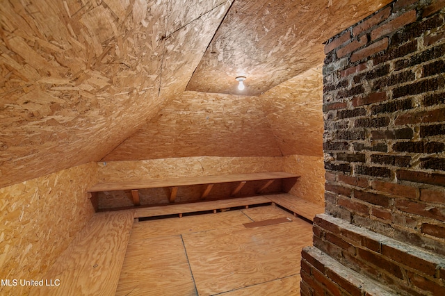 interior space featuring lofted ceiling