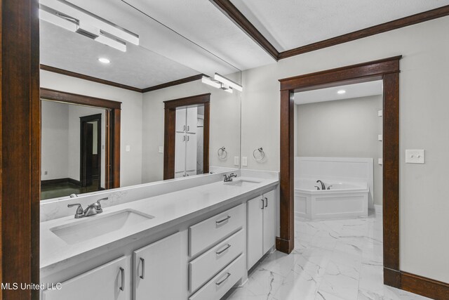 1609 SW Linda Dr, Clinton, MS 39056 - full bathroom featuring marble finish flooring, crown molding, baseboards, a bath, and double vanity