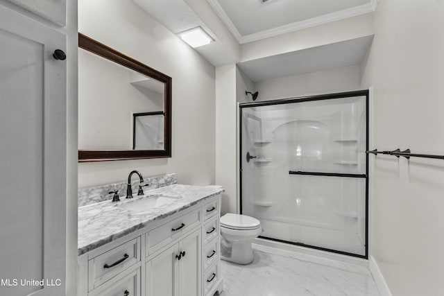 bathroom with vanity, toilet, walk in shower, and ornamental molding