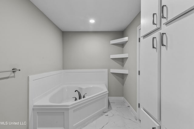 1609 SW Linda Dr, Clinton, MS 39056 - bathroom with marble look tile flooring, a bath, baseboards, and recessed lighting