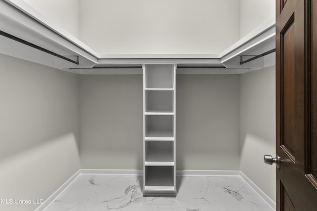 1609 SW Linda Dr, Clinton, MS 39056 - walk in closet featuring marble look tiles