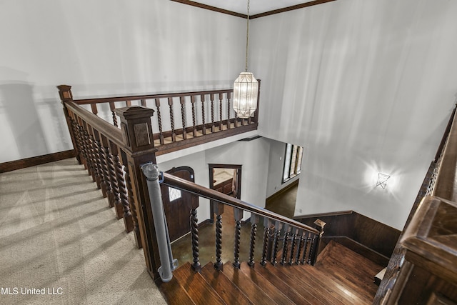 1609 SW Linda Dr, Clinton, MS 39056 - staircase featuring a chandelier, carpet, and baseboards