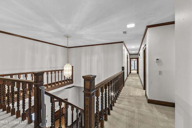 1609 SW Linda Dr, Clinton, MS 39056 - hall featuring an upstairs landing, light colored carpet, crown molding, a chandelier, and baseboards