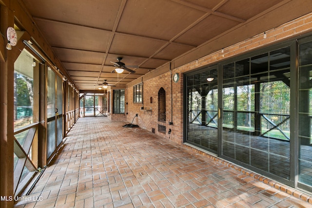 view of patio featuring ceiling fan