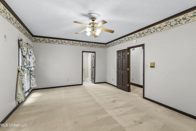 1609 SW Linda Dr, Clinton, MS 39056 - empty room with ornamental molding, light carpet, ceiling fan, and baseboards