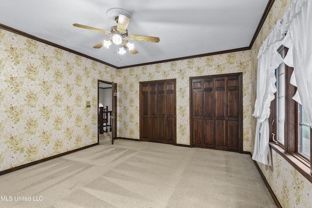 1609 SW Linda Dr, Clinton, MS 39056 - unfurnished bedroom with crown molding, wallpapered walls, light colored carpet, baseboards, and a ceiling fan