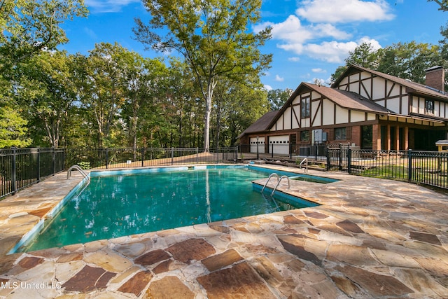 view of pool with a patio