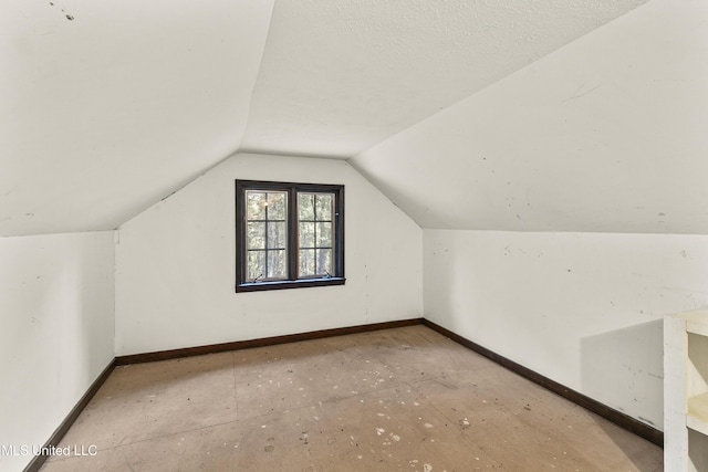 1609 SW Linda Dr, Clinton, MS 39056 - additional living space with baseboards and vaulted ceiling