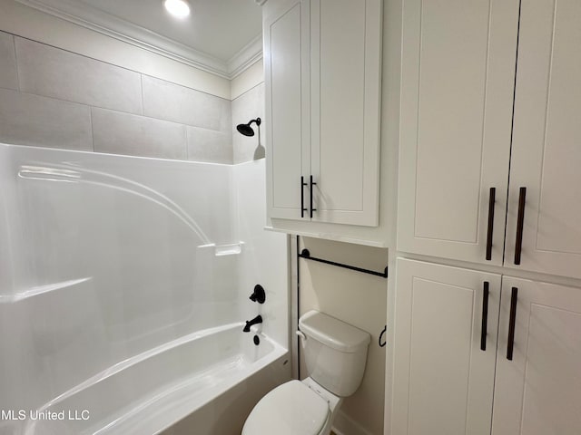 bathroom featuring toilet, ornamental molding, and washtub / shower combination