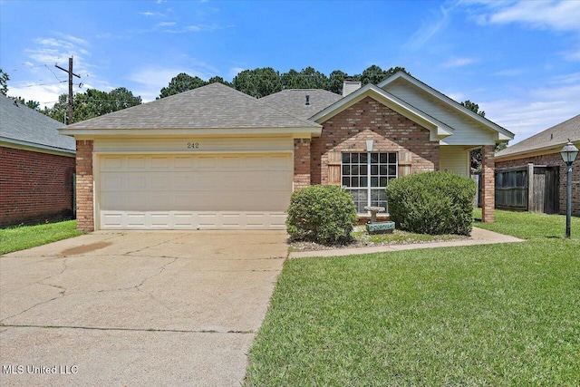 242 Commonwealth Ave, Brandon, MS 39047 - view of front of property with brick siding, driveway, a garage, a chimney, and roof with shingles