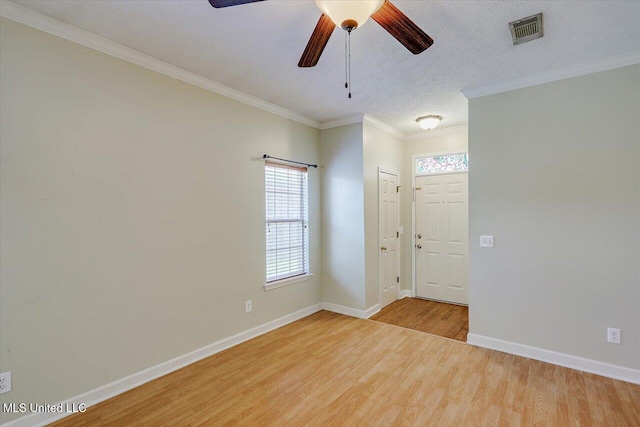 242 Commonwealth Ave, Brandon, MS 39047 - unfurnished room with wood finished floors, a ceiling fan, and ornamental molding