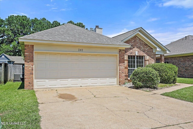 242 Commonwealth Ave, Brandon, MS 39047 - view of front of home featuring brick siding, a chimney, concrete driveway, roof with shingles, and a garage