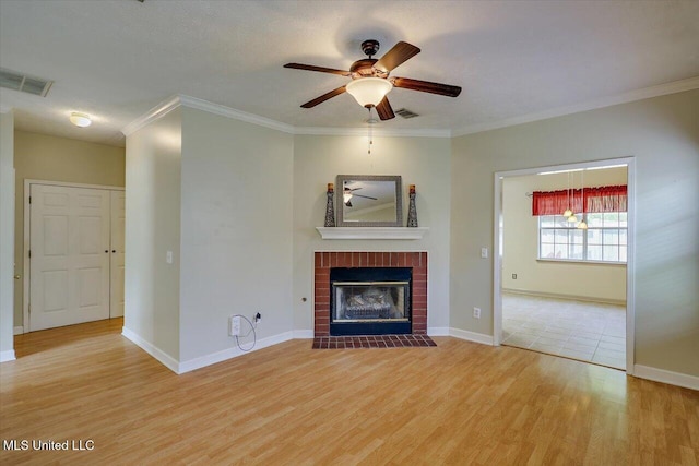 242 Commonwealth Ave, Brandon, MS 39047 - unfurnished living room with a fireplace, light wood-type flooring, a ceiling fan, and crown molding