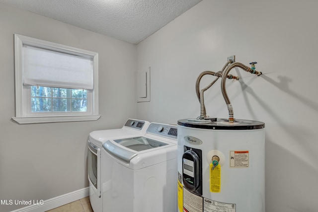 laundry room featuring water heater, washing machine and clothes dryer, a textured ceiling, laundry area, and baseboards