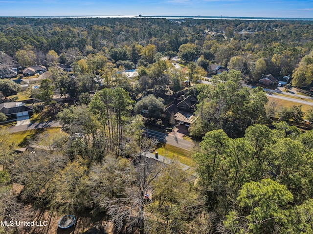bird's eye view featuring a view of trees