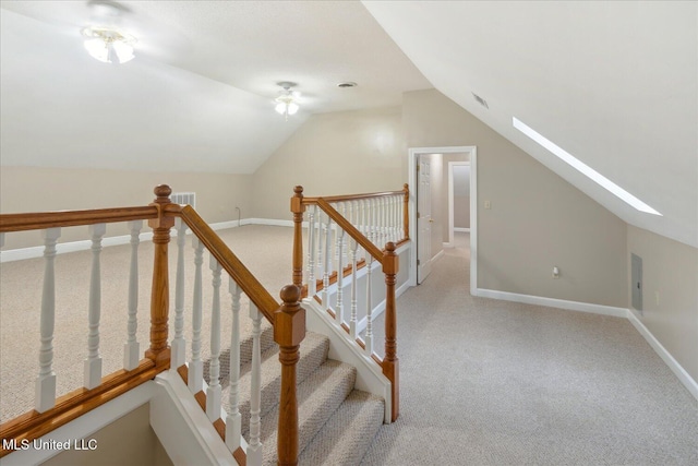 2674 S Slayden Rd, Lamar, MS 38642 - stairway featuring carpet and lofted ceiling with skylight