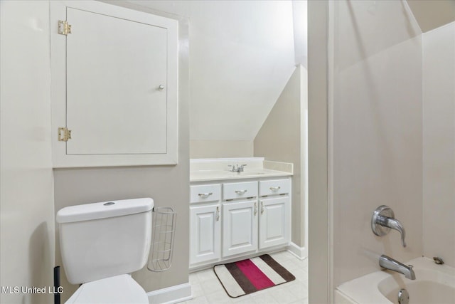 2674 S Slayden Rd, Lamar, MS 38642 - full bathroom featuring vanity, toilet, shower / tub combination, and vaulted ceiling