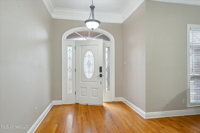 2674 S Slayden Rd, Lamar, MS 38642 - entryway featuring light wood-type flooring, ornamental molding, and a wealth of natural light