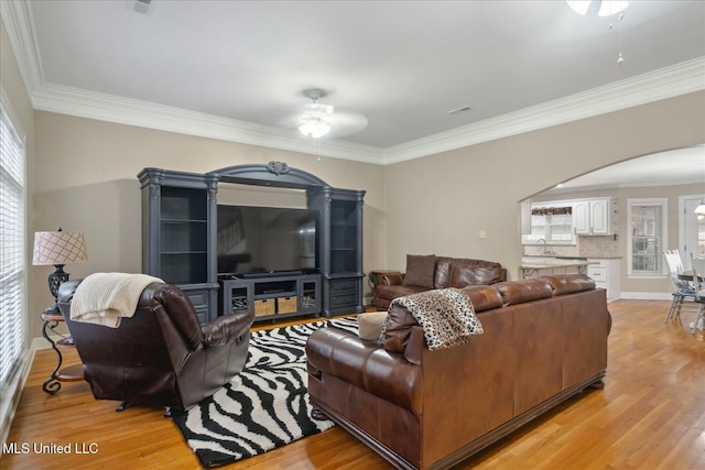 2674 S Slayden Rd, Lamar, MS 38642 - living room with crown molding, ceiling fan, and light wood-type flooring