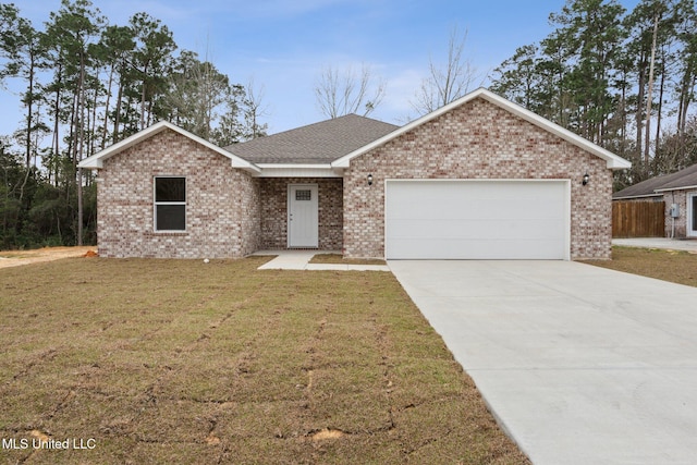 ranch-style house with a garage and a front yard