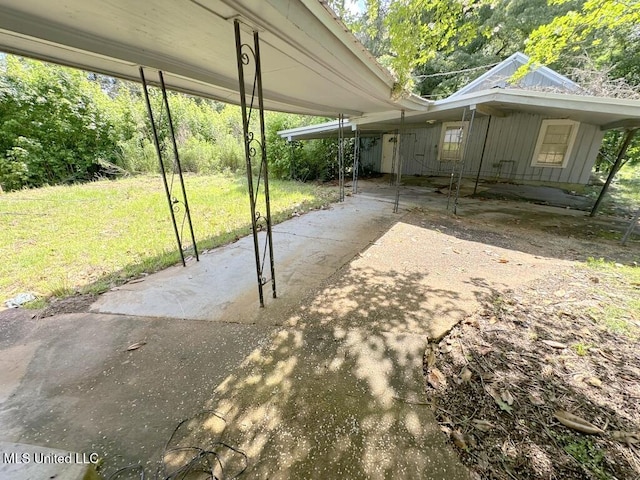 417 Boulevard St, Lexington, MS 39095 - view of patio with a carport