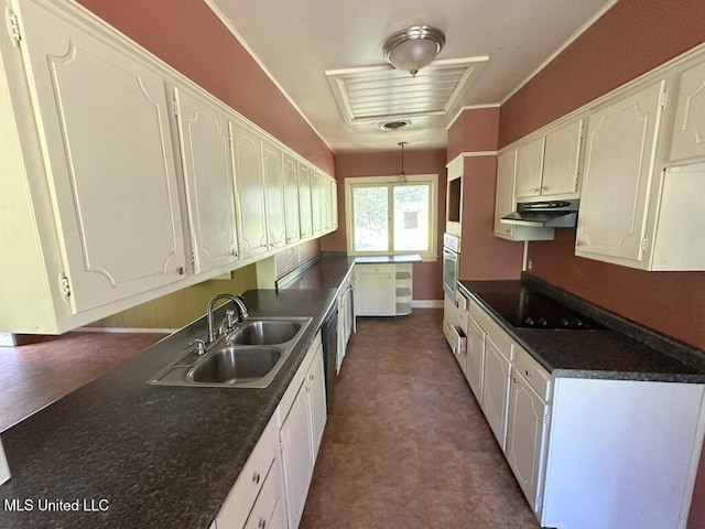 417 Boulevard St, Lexington, MS 39095 - kitchen featuring a sink, dark countertops, white cabinets, and stainless steel oven