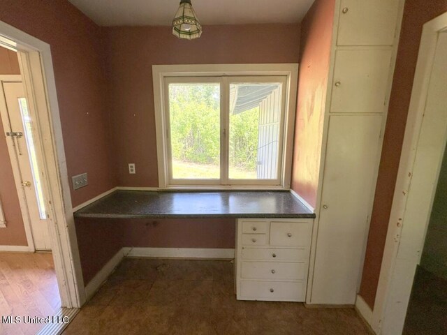 417 Boulevard St, Lexington, MS 39095 - unfurnished office featuring built in desk and baseboards