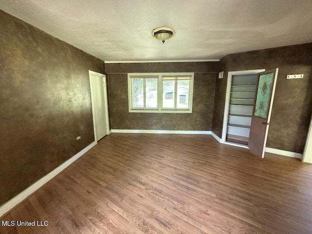 417 Boulevard St, Lexington, MS 39095 - empty room featuring wood finished floors and baseboards