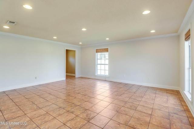 unfurnished room with baseboards, recessed lighting, visible vents, and crown molding