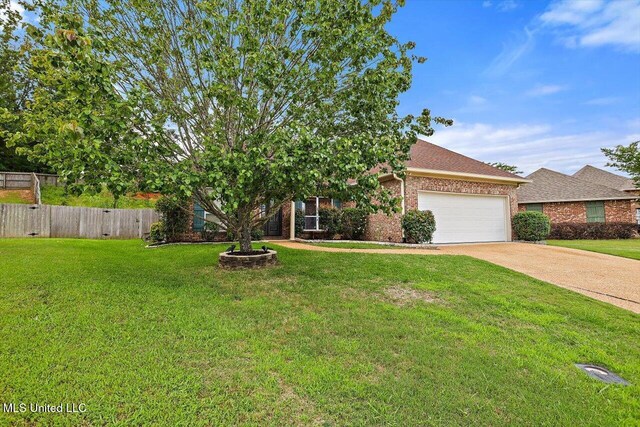 obstructed view of property with brick siding, a garage, driveway, and a shingled roof