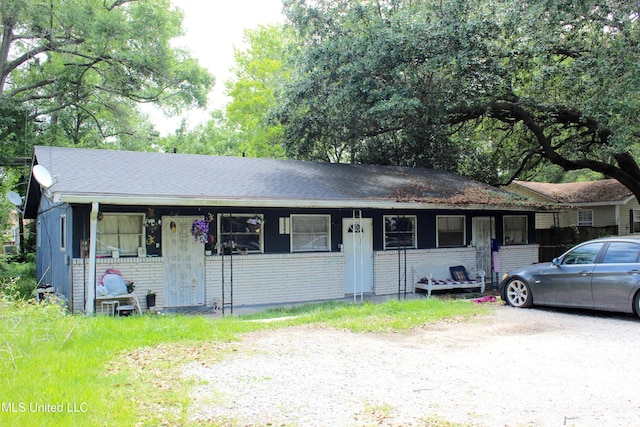 2208 22nd St, Pascagoula, MS 39581 - ranch-style house featuring brick siding and a shingled roof
