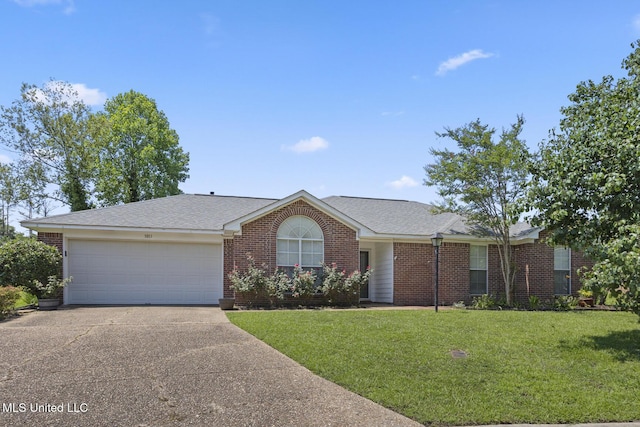 1013 Brashears Pt, Ridgeland, MS 39157 - ranch-style house featuring concrete driveway, brick siding, a garage, and a front lawn