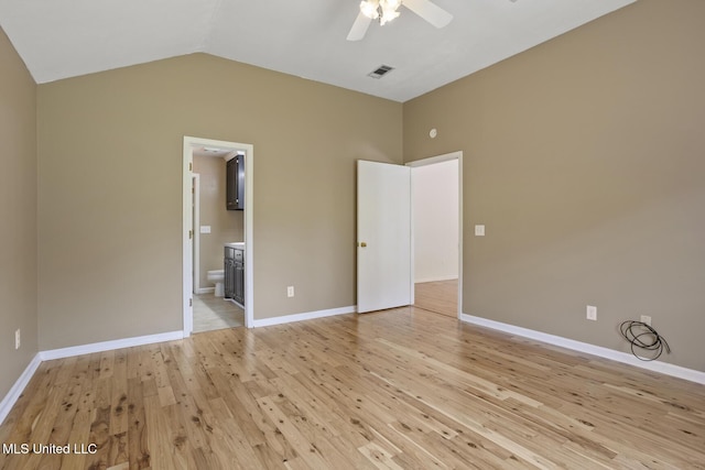 1013 Brashears Pt, Ridgeland, MS 39157 - unfurnished bedroom featuring light wood finished floors, vaulted ceiling, ensuite bathroom, and ceiling fan