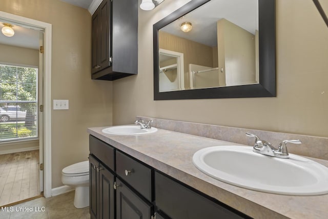 1013 Brashears Pt, Ridgeland, MS 39157 - bathroom featuring double vanity and a shower