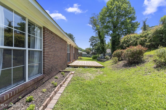 1013 Brashears Pt, Ridgeland, MS 39157 - view of green lawn with a deck