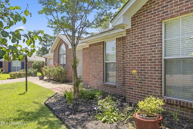 1013 Brashears Pt, Ridgeland, MS 39157 - view of home's exterior with brick siding and a yard