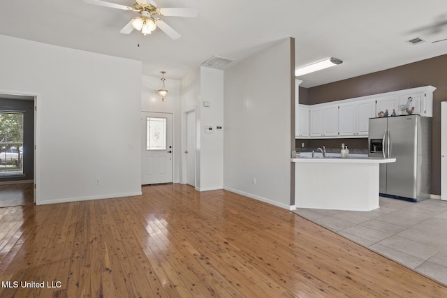 1013 Brashears Pt, Ridgeland, MS 39157 - unfurnished living room featuring light wood finished floors and ceiling fan