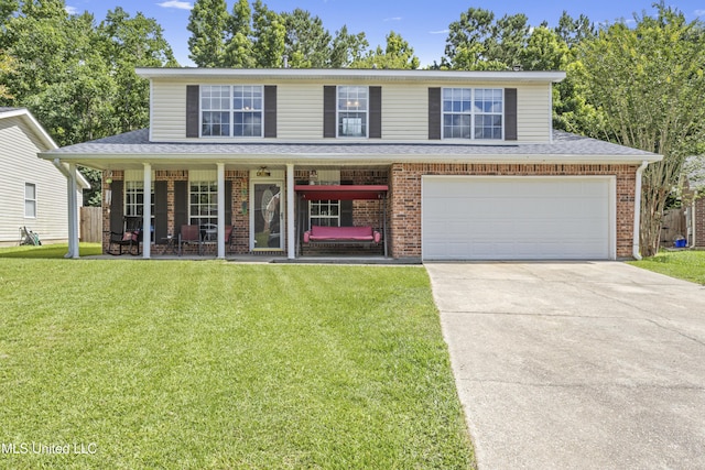 10510 Steeplechase Dr, Gulfport, MS 39503 - view of front facade with a porch, a front lawn, driveway, a garage, and brick siding