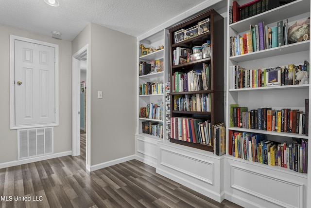 10510 Steeplechase Dr, Gulfport, MS 39503 - unfurnished room featuring wood finished floors and a textured ceiling