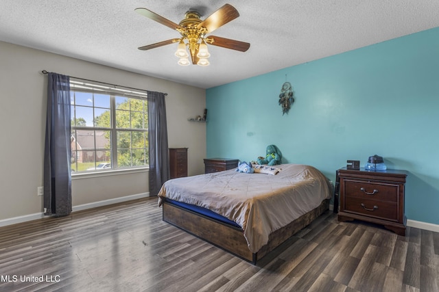 10510 Steeplechase Dr, Gulfport, MS 39503 - bedroom with wood finished floors, a textured ceiling, and ceiling fan