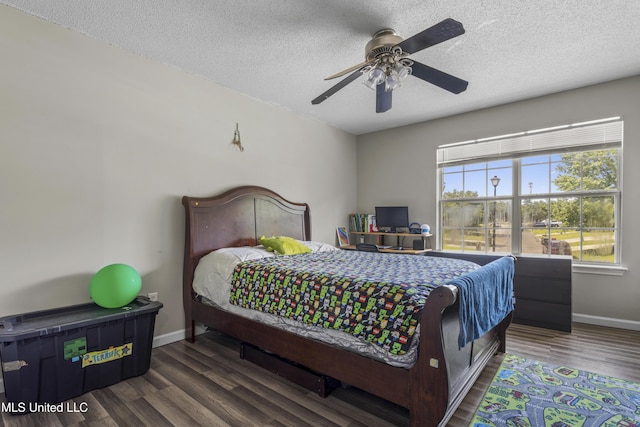 10510 Steeplechase Dr, Gulfport, MS 39503 - bedroom with wood finished floors, a textured ceiling, and ceiling fan