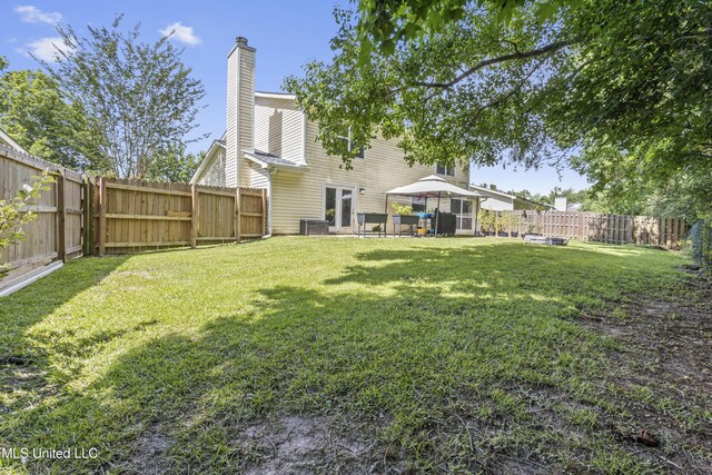 10510 Steeplechase Dr, Gulfport, MS 39503 - fenced backyard with a gazebo and a patio area