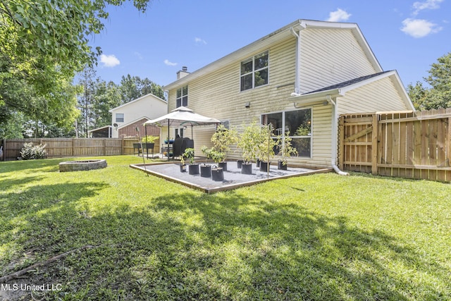 10510 Steeplechase Dr, Gulfport, MS 39503 - back of property with a fenced backyard and a patio area