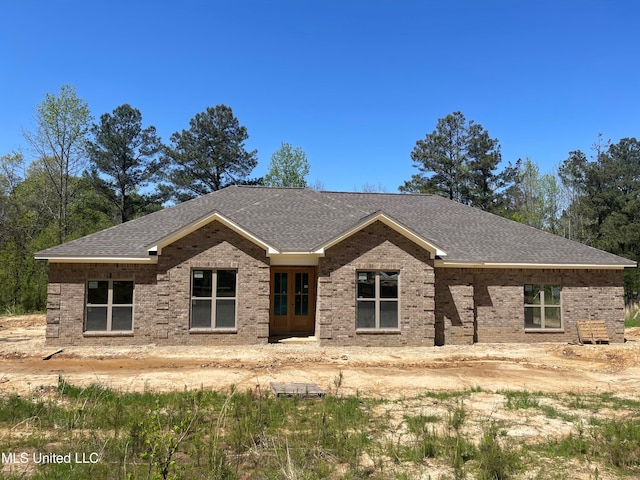 368 Magnolia Cir, Sarah, MS 38665 - view of front of property featuring brick siding, french doors, and a shingled roof