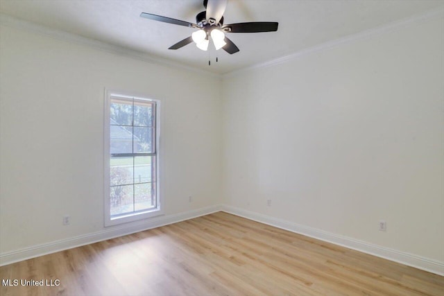 unfurnished room featuring ceiling fan, crown molding, and light hardwood / wood-style flooring