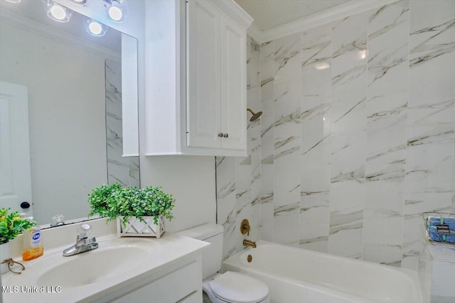 full bathroom featuring vanity, toilet, tiled shower / bath combo, and ornamental molding